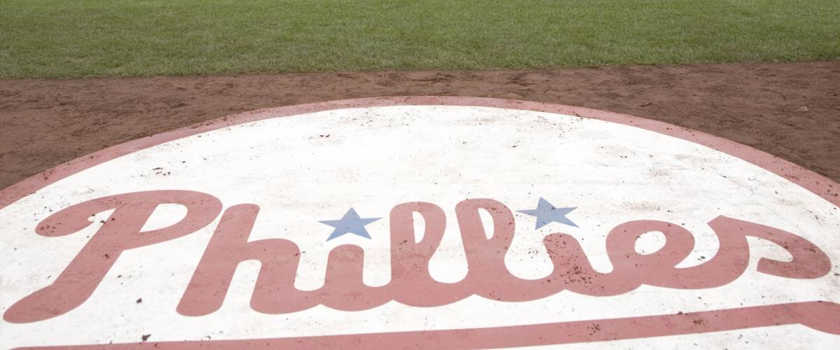 A closeup of Philadelphia Phillies baseball logo on field