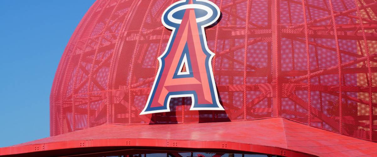 ANAHEIM, CA/USA - OCTOBER 10, 2015: Iconic oversized Angels baseball cap at the entrance to Angel Stadium, home of  Major League Baseball's Los Angeles Angels.