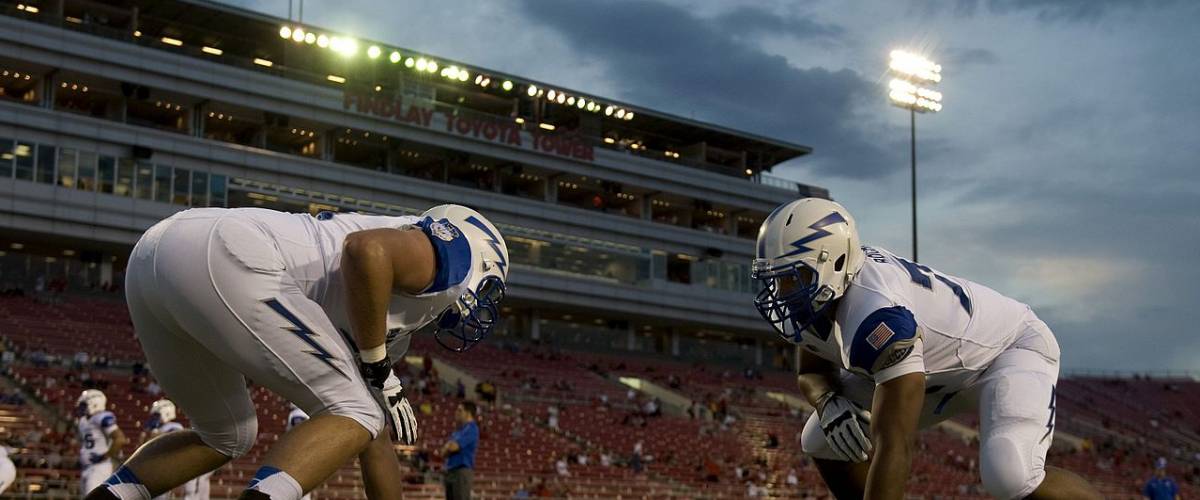 U.S. Air Force Academy Falcons football players practice before their game against the University of Nevada, Las Vegas Rebels Sept. 22, 2012, at Sam Boyd Stadium in Las Vegas.