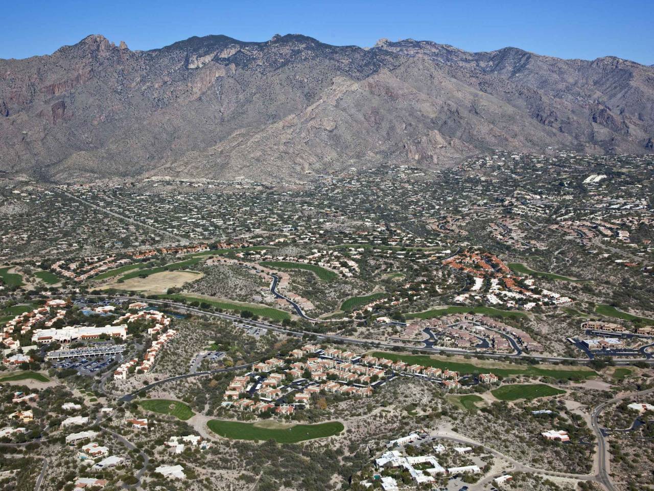 Scenic Catalina Mountains with golf course and resort properties