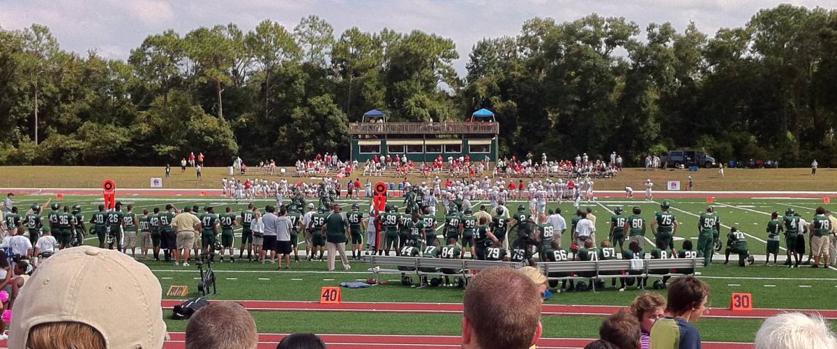 The Jacksonville Dolphins football team in action at D. B. Milne Field on the campus of Jacksonville University in Jacksonville.