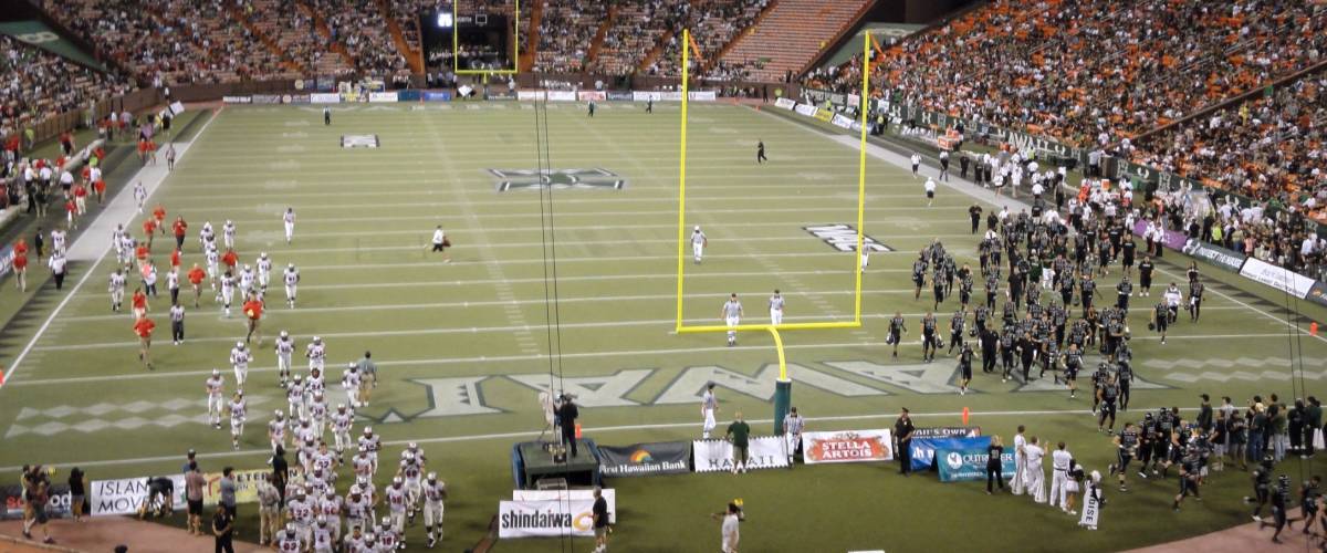 HONOLULU, HI - DECEMBER 4: UNLV vs. UH: Teams walk towards locker rooms at half time of football game. taken on December 4, 2010 at Aloha Stadium in Honolulu, Hawaii.